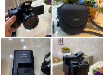 Canon Power shot Sx60 Hs təzədir adapteri və çantası var.