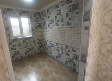 Zabrat qes.Ats yolu 2 sotda 65 kvm.sahesi olan 2 otaqli ev