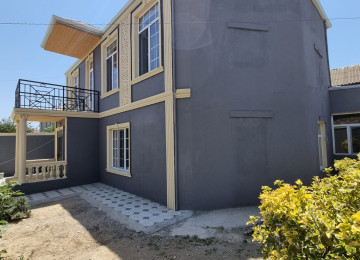 Zabrat 1 qesebinde tam merkez yerde Qai ilə üz üzə yolda