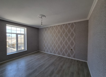 Zabrat 1 qesebinde tam merkez yerde Qai ilə üz üzə yolda