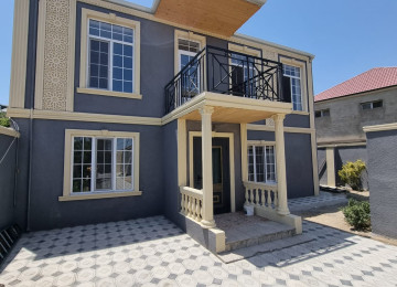 Zabrat 1 qesebinde tam merkez yerde Qai ilə üz üzə yolda