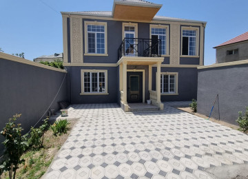 Zabrat 1 qesebinde tam merkez yerde Qai ilə üz üzə yolda