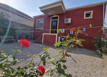 Zabrat qesebesinde marsurut yolunun üstünde Kerpic zavod