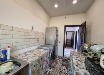 Zabrat qesebesinde marsurut yolunun üstünde Kerpic zavod