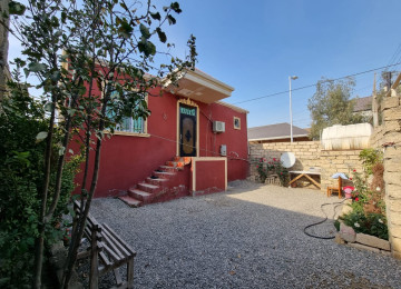 Zabrat qesebesinde marsurut yolunun üstünde Kerpic zavod