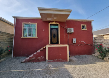 Zabrat qesebesinde marsurut yolunun üstünde Kerpic zavod