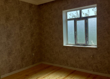 4 OTAQLİ QOŞA DAŞLA TUKİLMİŞ ALTI QARAJLI EV SATİLİR!