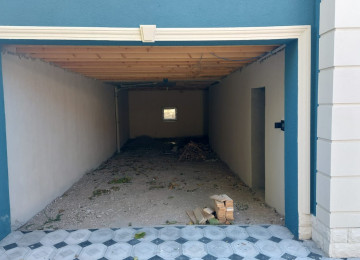 4 OTAQLİ QOŞA DAŞLA TUKİLMİŞ ALTI QARAJLI EV SATİLİR!