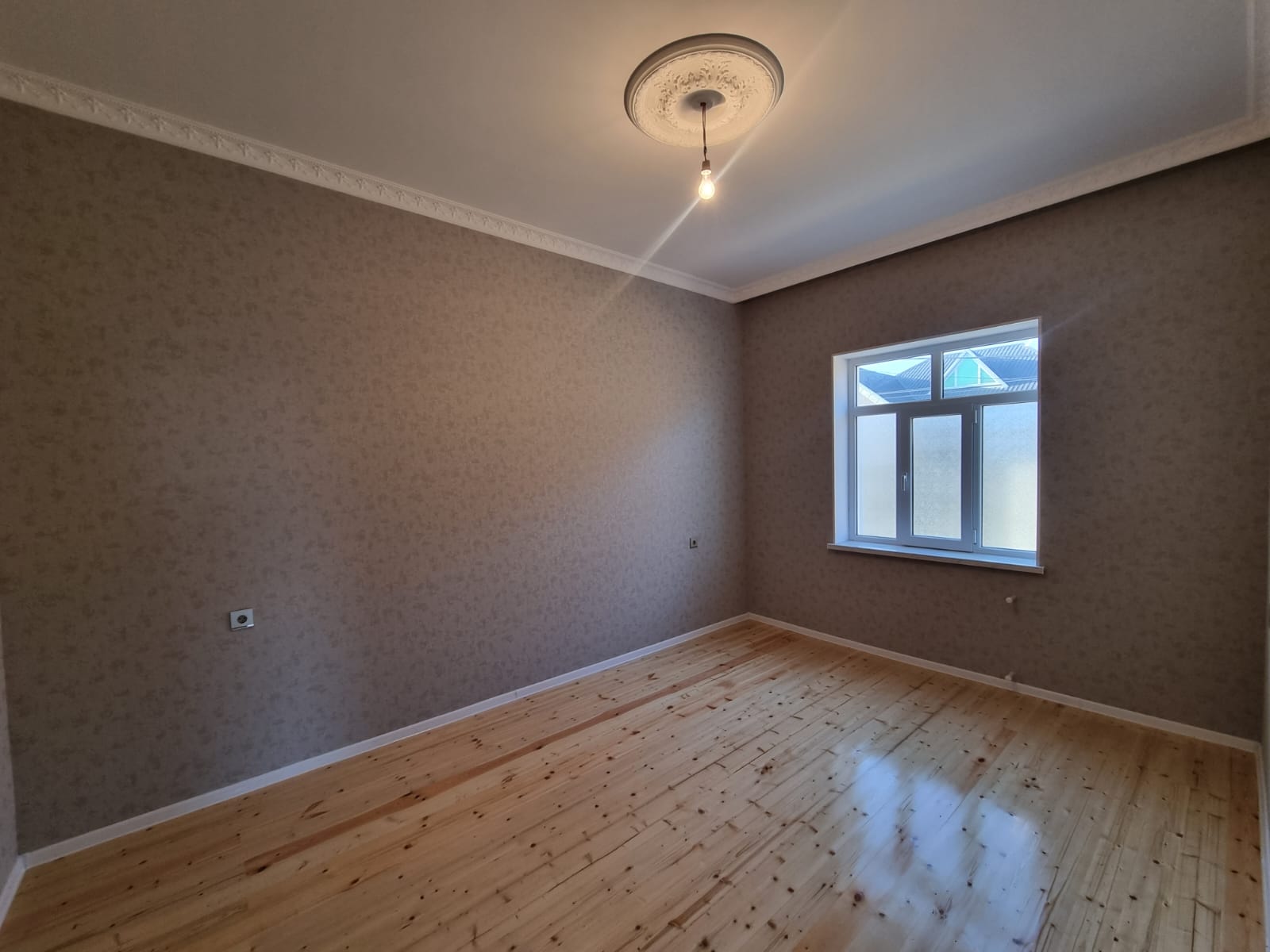 Zabrat Mehemmedli yoli şeher yoluna 100 metr mesafede yaxin