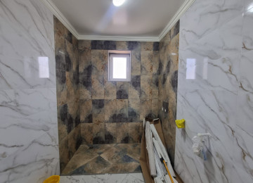 Zabrat Mehemmedli yoli şeher yoluna yaxin 2 sotda 130kvm.4