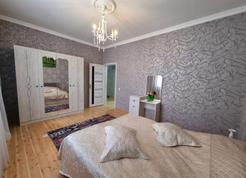 Zabrat Mehemmedli yolu 3 sotda 130 kvm.4 otaqli,alti