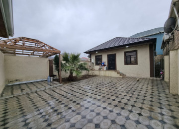 Məhəmmədli qəsəbəsi 2,5 sotda 110 kvm.3 otaqli,kursulu,tam