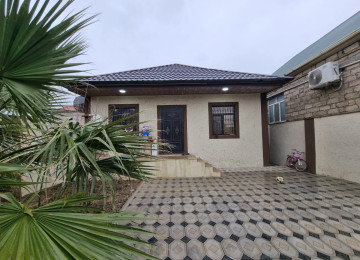 Məhəmmədli qəsəbəsi 2,5 sotda 110 kvm.3 otaqli,kursulu,tam