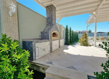 Merdekanda Qowa qalanin arxasi 11 sot kupcali 500 kv 7 otaq