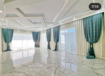 Merdekanda Qowa qalanin arxasi 11 sot kupcali 500 kv 7 otaq