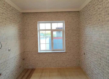 Suraxanı rayonu Hövsan qes. maşın bazarın arxasında 2 sotun