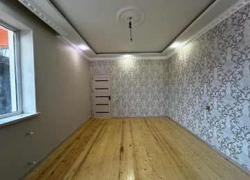 Ramani sovxozda 2 sotda 100 kvm.sahesi olan 3 otaqli