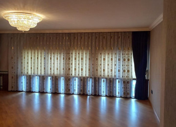 Mansard Duplex Menzil satılır 7 otaqlí te'mirli ve mebelli