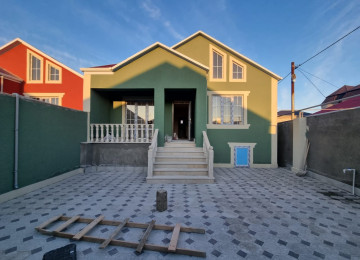 Mehemmedli yolu 2,5 sotda 130kvm.4 otaqli ev satilir.Ev