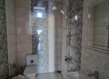 Mehemmedli yolu 2,5 sotda 130kvm.4 otaqli ev satilir.Ev