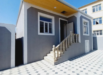 Saray qesebesinde yolun kenarinda 70kv.m 2 sota ev satılır