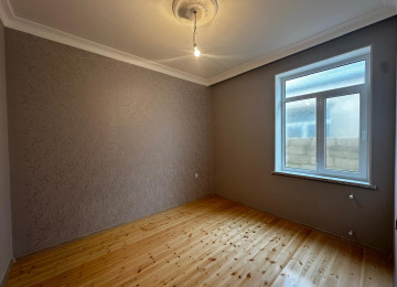 Zabrat Məhəmmədli yolu əsas yola yaxın 2 sot 125 kvm.4