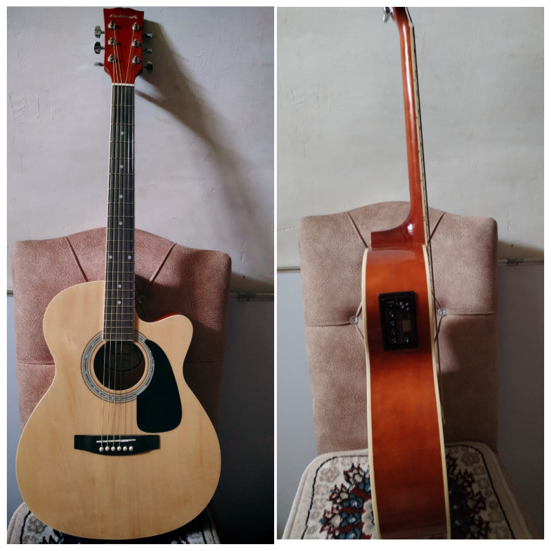 Gitara Akustik 6 simli gitara 330 azn satılır. Təzədir. Ünvan