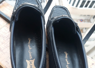 Orta yaşlı xanım üçün ayaqqabı Xanım üçün İran ayaqqabısı.