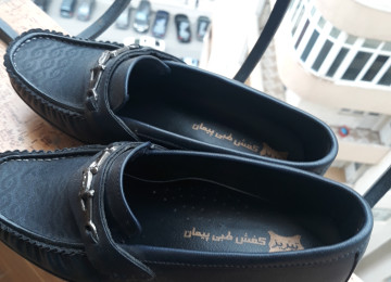 Orta yaşlı xanım üçün ayaqqabı Xanım üçün İran ayaqqabısı.