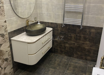 İnşaatçılar metrosu yaxınlığında 3 otaqlı Əla təmirli