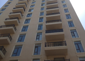 4 otaqlí natamam.temirli menzil satílír 180 kv,18/10