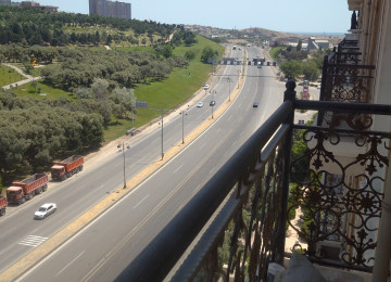 4 otaqlí natamam.temirli menzil satílír 180 kv,18/10