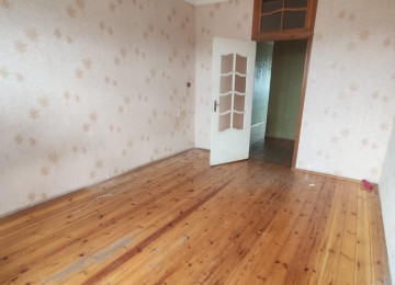 3 otaqlí temirsiz menzil satílír.9/9 cu mertebesi 65 kv.m,