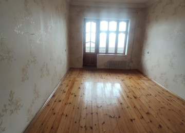 3 otaqlí temirsiz menzil satílír.9/9 cu mertebesi 65 kv.m,