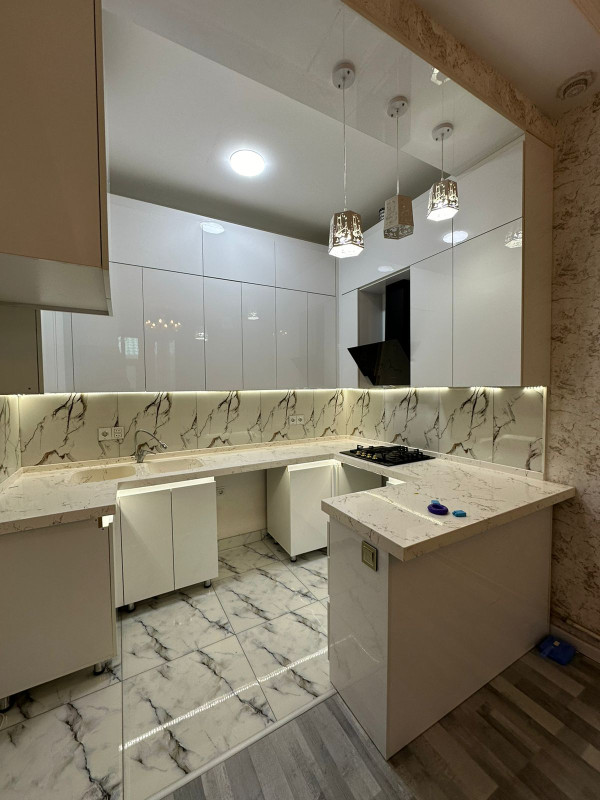 2 otaqlı,52m2,Yeni TİKİLİ-Masazırda Masazırda Çıxarışlı(Kupçalı)mənzil satılır. Bina Yeni