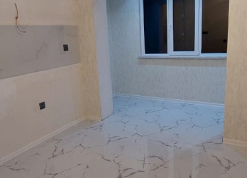 2 otaqlı təmirli mənzil satılır 9/3-cü mərtəbəsi 70