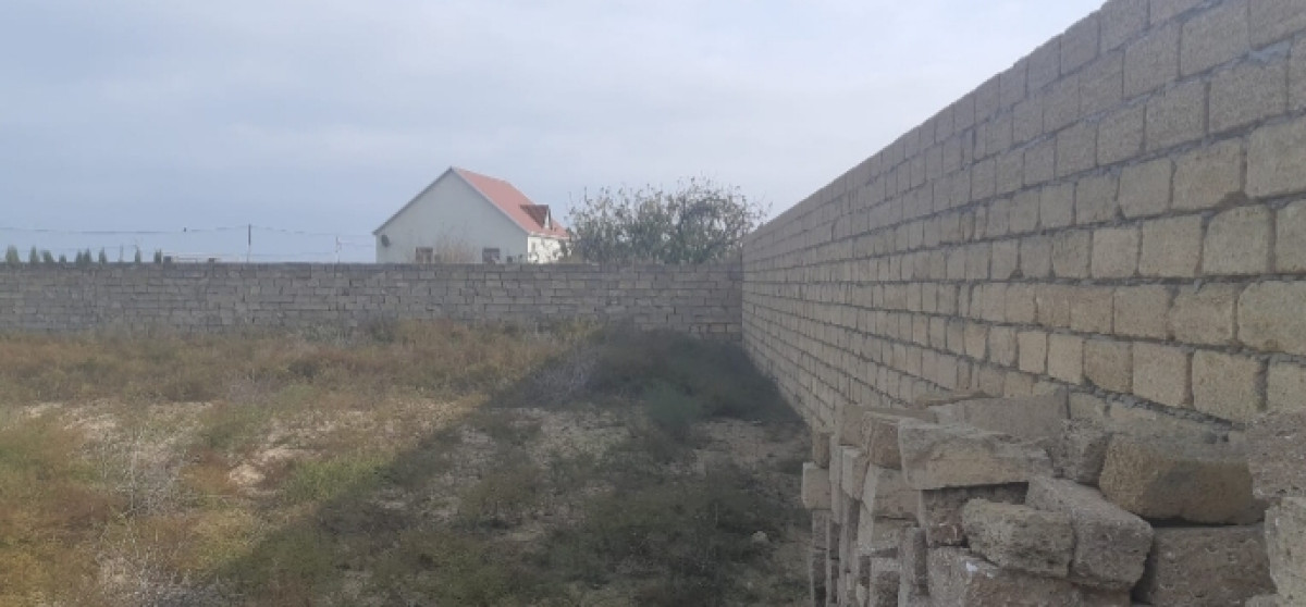 Torpaq Dənizə çox yaxın Landau məktəbə yaxın hazır hasara alınmış