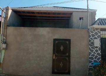 Masazirda 2 otaqli 65 kv 1 mertebeli temirli marşruta 50