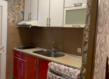 Riyat ticaret merkezin yaxlql 1 otaq 2 ye olmus tam temirli