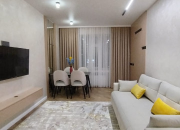 Əhmədlidə super təmirli əşyalı 3 otaq mənil satılır 65 kv.m Xətai rayonu Əhməli mst 3-4-dəqiqəlik ayaqla məsafədə Bakı