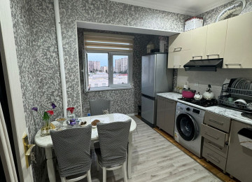 Mehmandarov küçəsi 263 nömrəli məktəbin yanında 9 mərtəbəli