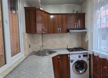 Riyyat ticaret Merkezide 1 otaq 2 ye olmus 45 kv 11