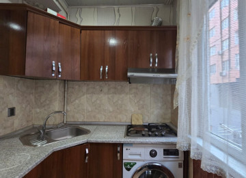 Riyyat ticaret Merkezide 1 otaq 2 ye olmus 45 kv 11