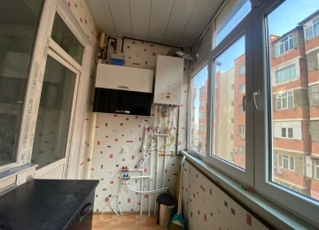 Riyyat Ticaret Merkezinin yanl 1 otaq 2 ye olmus Menzil