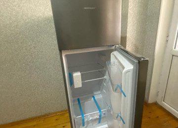 Riyyat Ticaret Merkezinin yanl 1 otaq 2 ye olmus Menzil