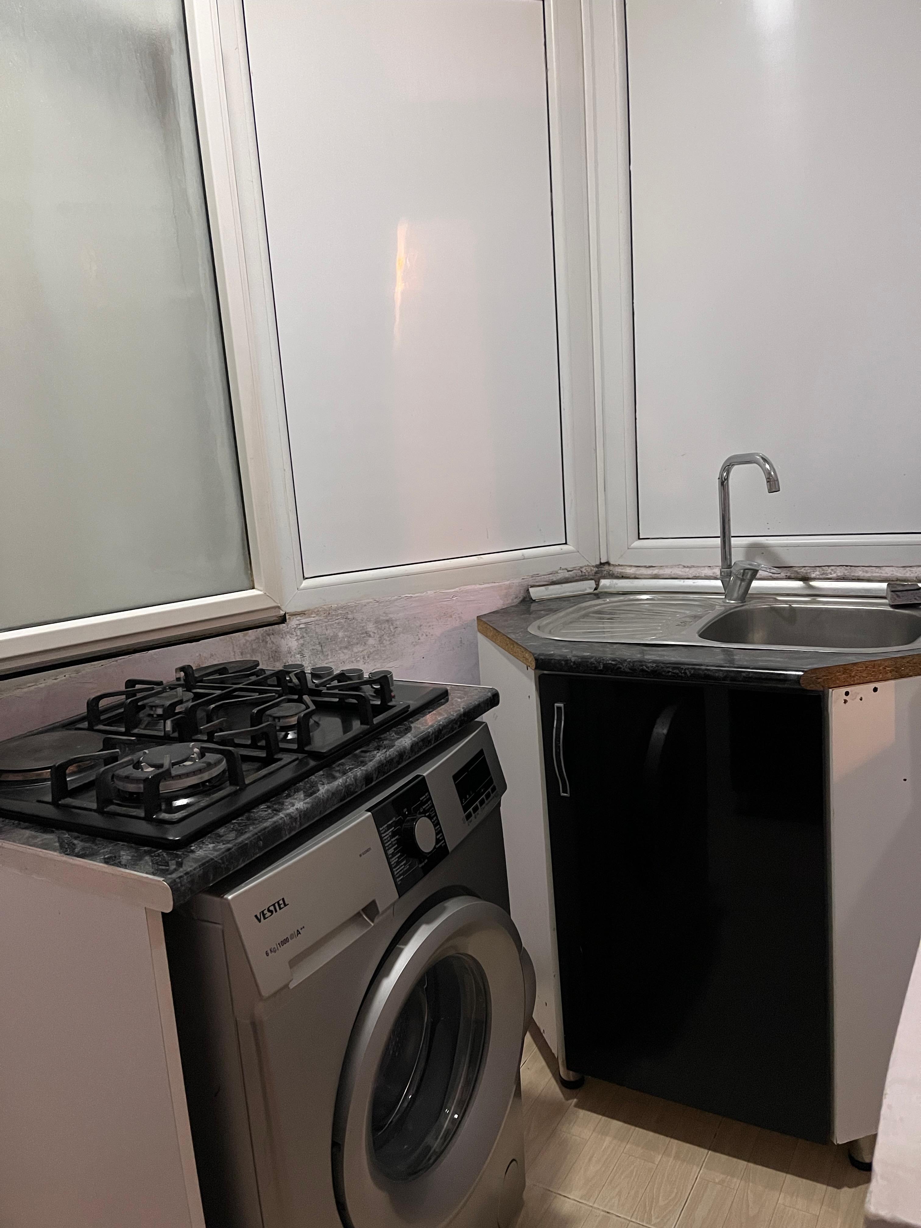 Riyat Ticaret Merkezide 1 otaq duzelme 2 ye olmus 50 kv 11