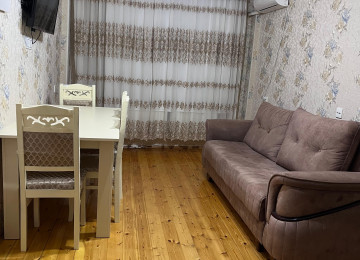 Riyat Ticaret Merkezide 1 otaq duzelme 2 ye olmus 50 kv 11