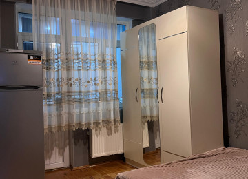 Riyat Ticaret Merkezide 1 otaq duzelme 2 ye olmus 50 kv 11