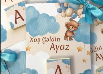 Ad gunleri ucun sokoladli pankartlar sifarisle